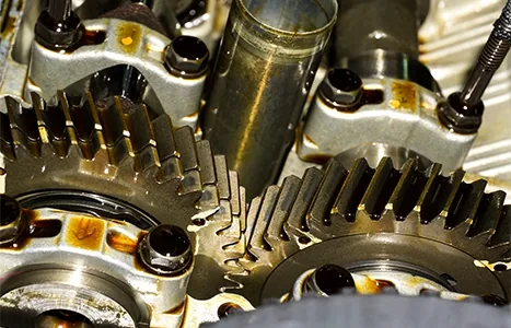 Close-up of lubricated engine gears